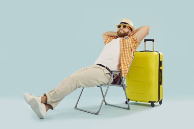Summer vacation man beach wear, sitting relaxed in tourist chair enjoying trip holiday. Holidaymaker recreation, travelling pleasure, happy rest, relaxation, enjoyment to become less tired or anxious clipart
