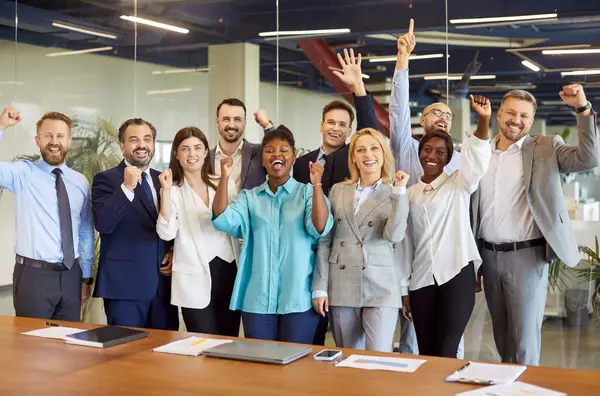 stock image Corporate portrait of overjoyed diverse office employees workers show to recommend good quality company service, happy multiethnic colleagues celebrate shared business success or victory, hr team