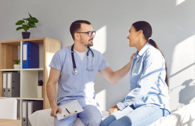 Visit to doctor office, female patient getting professional nurse consultation, help, support. Woman couch sitting communicates effectively describing her symptoms, medical wellbeing small business