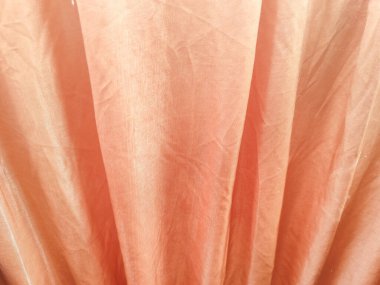 Pembe kumaşın soyut arkaplanı.