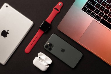 Flat Lay of different apple products on a grey background  clipart