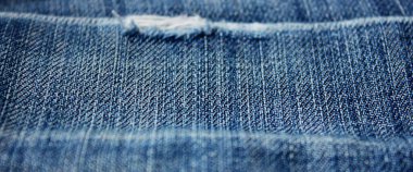 Denim. Kot kumaşı. Kot pantolon arka planı. Denim kot kumaşı veya kot pantolon arka planı.