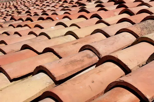 red tile roof on a building close up