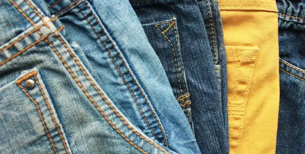 Denim. Kot kumaşı. Kot pantolon arka planı. Denim kot kumaşı veya kot pantolon arka planı.