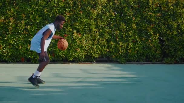 Sportive African American Man Playing Basketball Open Street Court Dribbling — Stock Video