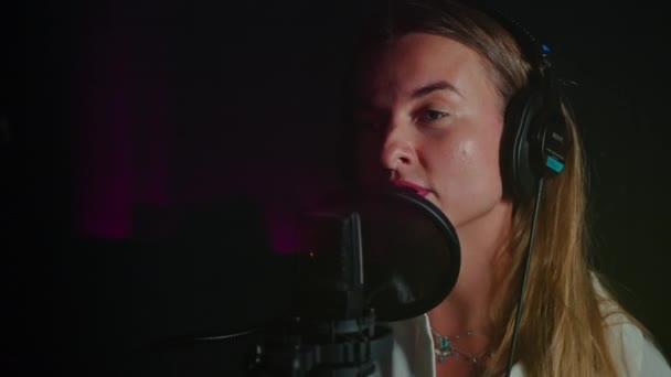 Young Woman Headphones Speaking Microphone Recording Studio Energetic Radio Host — Stock Video