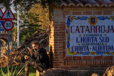 Photo shows the aftermath of the recent flood in Alfafar, Valencia, Spain. Captured are damaged homes, roads, cars and the efforts of residents, emergency services and volunteers to clean and rebuild. clipart