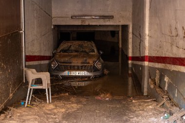 Photo shows the aftermath of the recent flood in Alfafar, Valencia, Spain. Captured are damaged homes, roads, cars and the efforts of residents, emergency services and volunteers to clean and rebuild. clipart