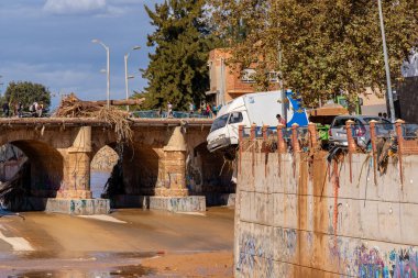 Photo shows the aftermath of the recent flood in Alfafar, Valencia, Spain. Captured are damaged homes, roads, cars and the efforts of residents, emergency services and volunteers to clean and rebuild. clipart