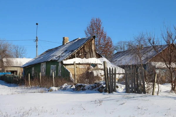 old village house in winter day