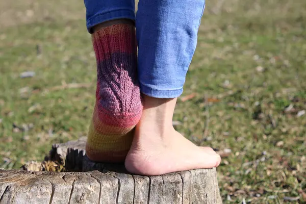 young woman wearing colorful socks