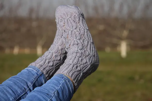 woman \'s feet in socks