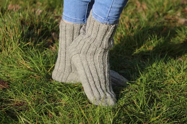 female legs in socks in autumn