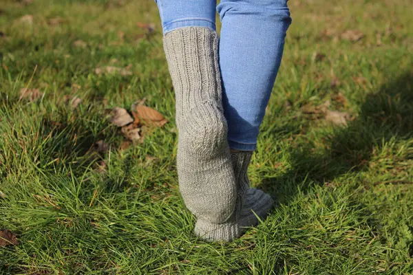 woman in stylish socks outdoors