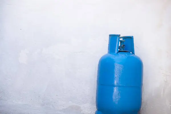 Blue gas tube on white background LPG cylinder cooking gas