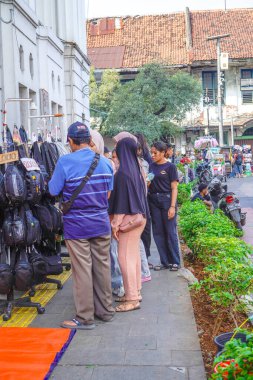 Eski şehir Jakarta, 20 Temmuz 2024 - Doğu Endonezyalı insanlar eski şehir Jakarta 'da dolaşıyorlar.