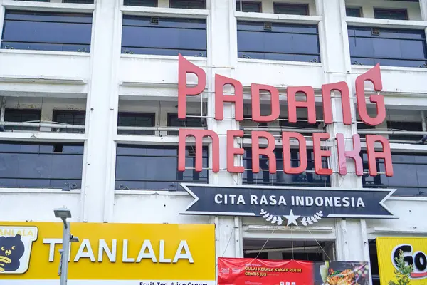 stock image old city of jakarta, july 20, 2024- People walking in front of the Padang restaurant in the old city of Jakarta.