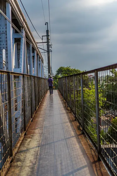 stock image pedestrian bridge with copy space.