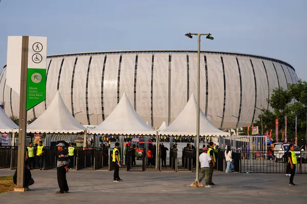 stock image Ancol North Jakarta, August 10, 2024, exterior view of the football stadium with coaches passing by to enter.