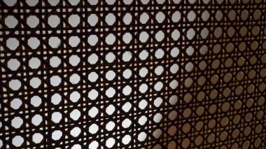 Bambu rattan arkaplanda yakın çekim desenli dokuma bambu. Rattan geleneksel el işi dokuması. Antika ve klasik el sanatları.