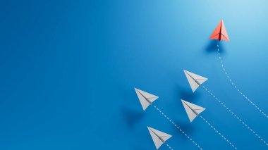 Liderlik ve takım çalışması kavramı. Kağıt üzerinde uçan kağıt uçaklarla liderlik ve takım çalışması