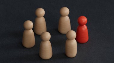 Kırmızı insan figürü bir insan çemberi ile çevrili. Lider Patron ve liderlik. İşbirliği ve takım çalışması. Dışlanmış, nefret edilen rakip, suçlu. Mahkumiyet. Ayrımcılık ve şiddet.