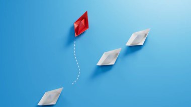 Bir grup mavi kağıttan tekne bir yöne, bir kırmızı ise diğer yöne gidiyor. Olağanüstü kişilik kavramı, toplumun temellerine aykırı davranmaktır.
