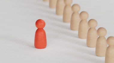 Etkilemek ve güçlendirmek için bir ekiple birlikte duran tahta bir figür. Liderlik kavramı, başarılı yarışma galibi ve yeni normal bir yaşam tarzı için nüfuzlu ve sosyal mesafeli lider.