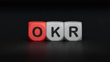 İş ve tasarım konsepti - sürreal tahta küp OKR. Liderliğin, iletişimin ve başarının sembolü. Siyah arkaplanda oluşturulan iş konsepti 3D.