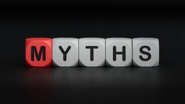 Kelime efsaneleri. Kullanılabilir harf içeren ahşap küçük küpler. Ahşap elementlere yakın, siyah arkaplanda 3D iş konsepti.