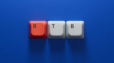 rtb, real, time, bidding. wooden table with Computer keyboard keys. text on wood blocks.close up of Computer keyboard keys,Business Concept.3D rendering on blue background. clipart