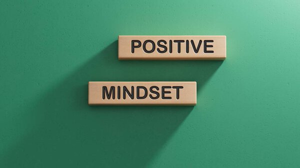 Positive Mindset symbol. Concept words Positive Mindset on wooden blocks.Business and Positive Mindset concept. Copy space.3D rendering on green background.