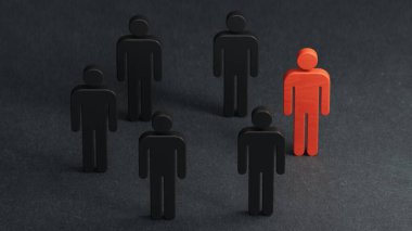 Kırmızı insan figürü bir insan çemberi ile çevrili. Lider Patron ve liderlik. İşbirliği ve takım çalışması. Dışlanmış, nefret edilen rakip, suçlu. Mahkumiyet. Ayrımcılık ve şiddet.