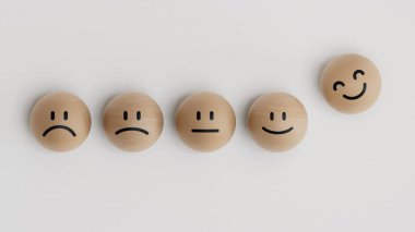 Tahta top bloklarında gülen yüz sembolü. Müşteri hizmetleri değerlendirmesi ve memnuniyet araştırması konseptleri. Hizmet derecelendirme, sıralama, müşteri gözden geçirme 3D beyaz arkaplan üzerinde yorumlama.