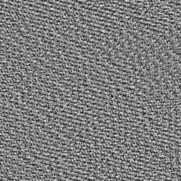 Küçük noktalı gri bir halı.