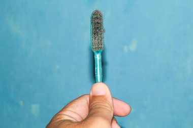 Dirty toothbrush, no longer used clipart