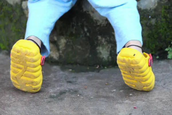 stock image Little boy in yellow shoes