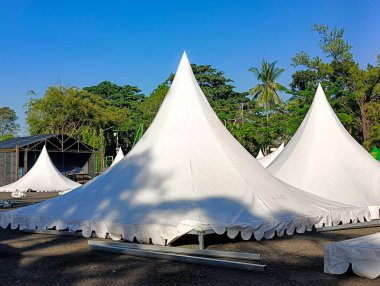 Banjarbaru-Indonesia, 14 July 2024: The roof of the stand tent that has been dismantled clipart