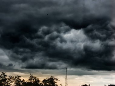 Dark clouds indicate heavy rain clipart