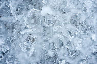 Buz dokusu. Kışın donmuş şelale. Buz duvar kağıdı soyut