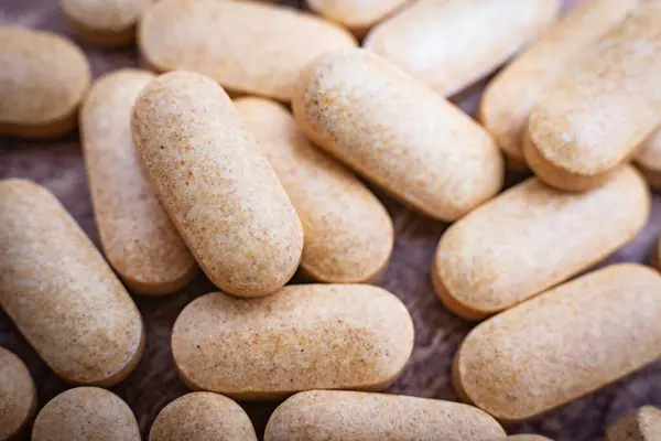 C vitamini haplarının yakın plan fotoğrafı.