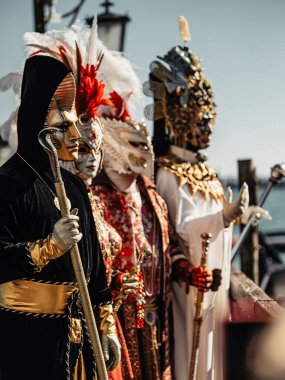 venice, italy - march 4, 2 0 2 5 : unidentified participants in venice carnival. clipart