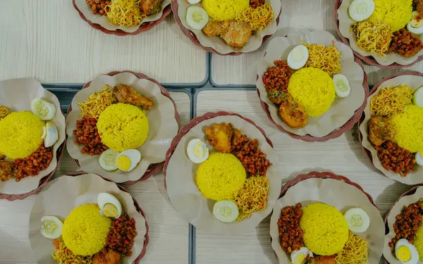 Top view of Yellow rice in a plate. In Indonesia called 