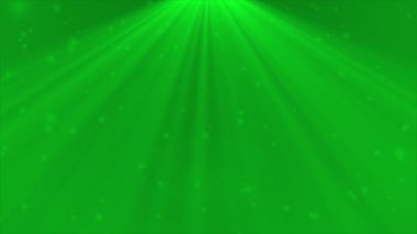 Canlı, zarif, yeşil parçacıklar parlak optik ışık ışınlarıyla arka plandan düşüyorlar.
