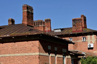 old brick building with a chimney
