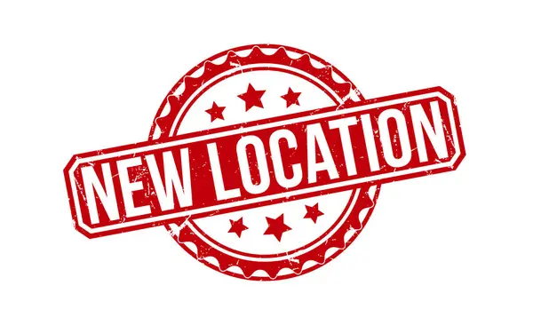 Beyaz arkaplanda kırmızı kauçuk damga var. Yeni pul damgası. Yeni konum damgası