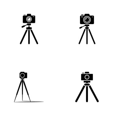Glyph illüstrasyonunda, bir tripodun üzerinde temiz ve kalın bir ikon olarak biçimlendirilmiş bir fotoğraf makinesi bulunur. Beyaz, gösterişli ekipman siluetinde izole edilmiş..