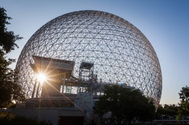 View of the Montreal Biosphere at sunrise, Montreal, Quebec, Canada. The Biosphere is a museum dedicated to the preservation of St. Lawrence River, the Great Lakes ecosystem and the world around us. clipart