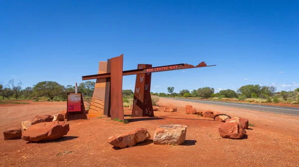 Signpost of the Red Center Way, a grand tour of the very best of central Australia, Lesseter Highway Luritja Road cross, Northern Territory, Australia