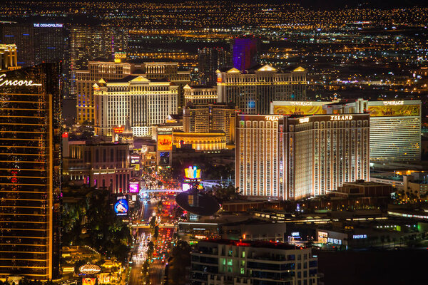 Famous Las Vegas Strip (Las Vegas Boulevard) at night. View towards the south end of the strip: Encore, Treasure Island, Mirage, Caesar's Palace, Belagio, The Cosmopolitan and many other luxury casino resorts in the heart of Las Vegas.